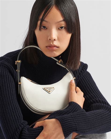 designer wickeltasche prada|prada arque bag.